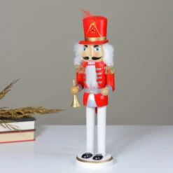 Northlight 14" Red And White Wooden Christmas Nutcracker With Horn -Chic Christmas Decoration nutcrackerfactory 97187 3 82054.1665519667